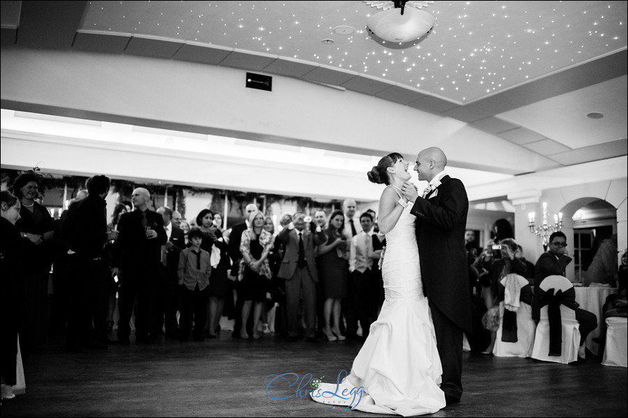 Bride and groom dance together at Pembroke Lodge