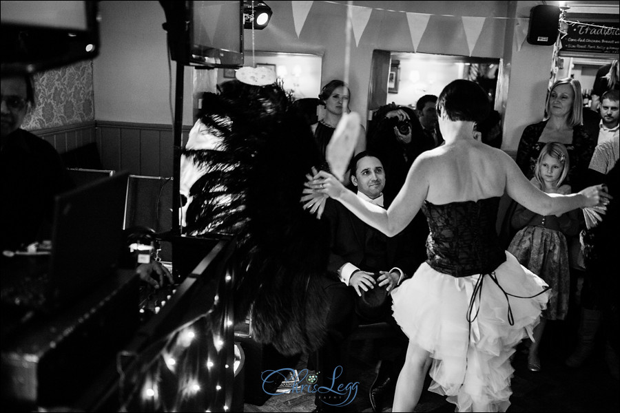 Bride giving the groom a burlesque dancing performance!